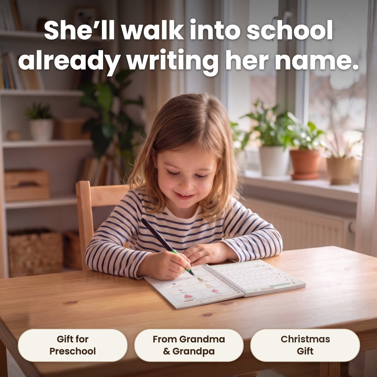 She'll walk into school already writing her name: a smiling girl writes in an open copybook at a table, with labels Gift for preschool, From Grandma and Grandpa, Christmas gift.