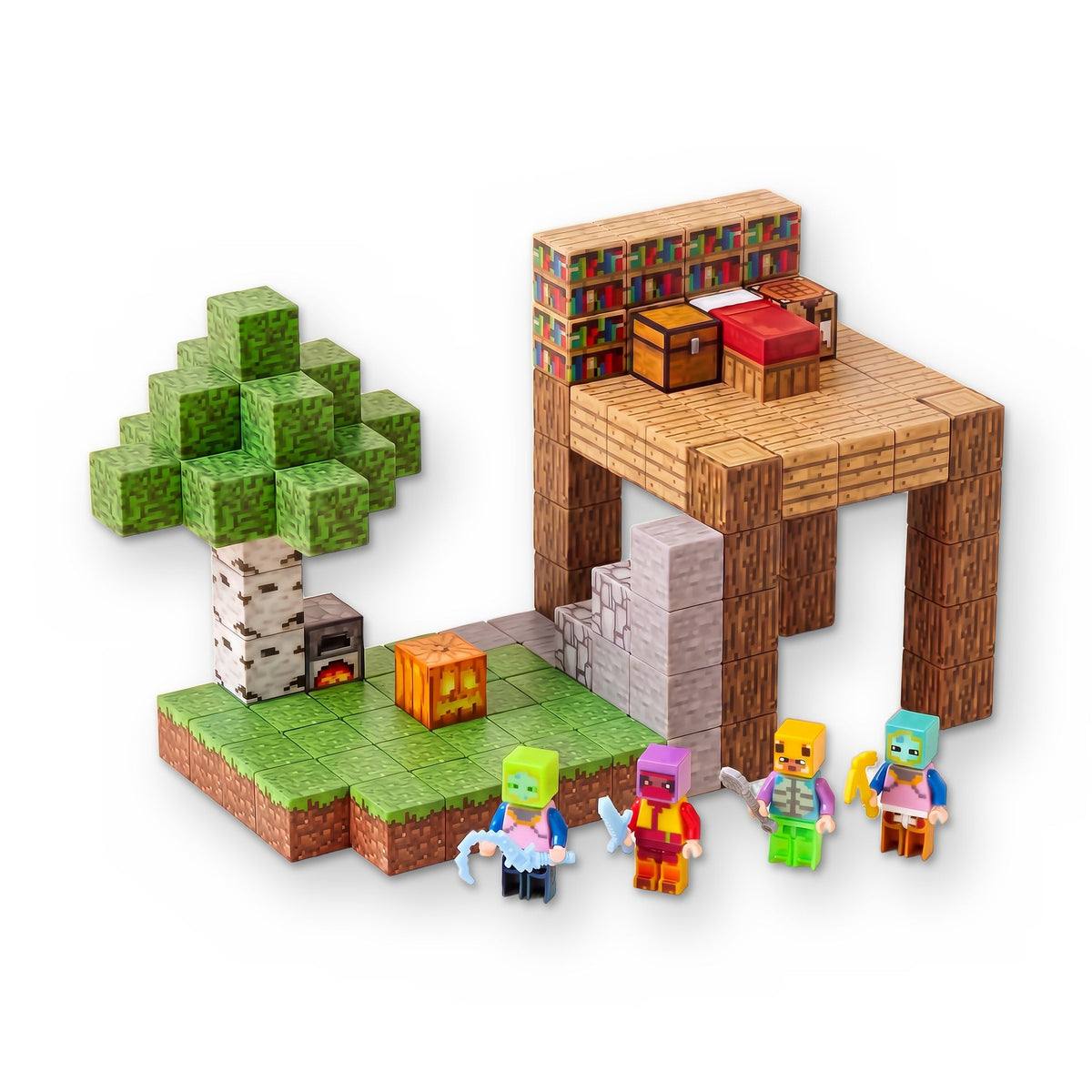 Cubes built into a tree, a grassy base, stone steps and a raised wooden deck with a bed and chest, with four toy figures