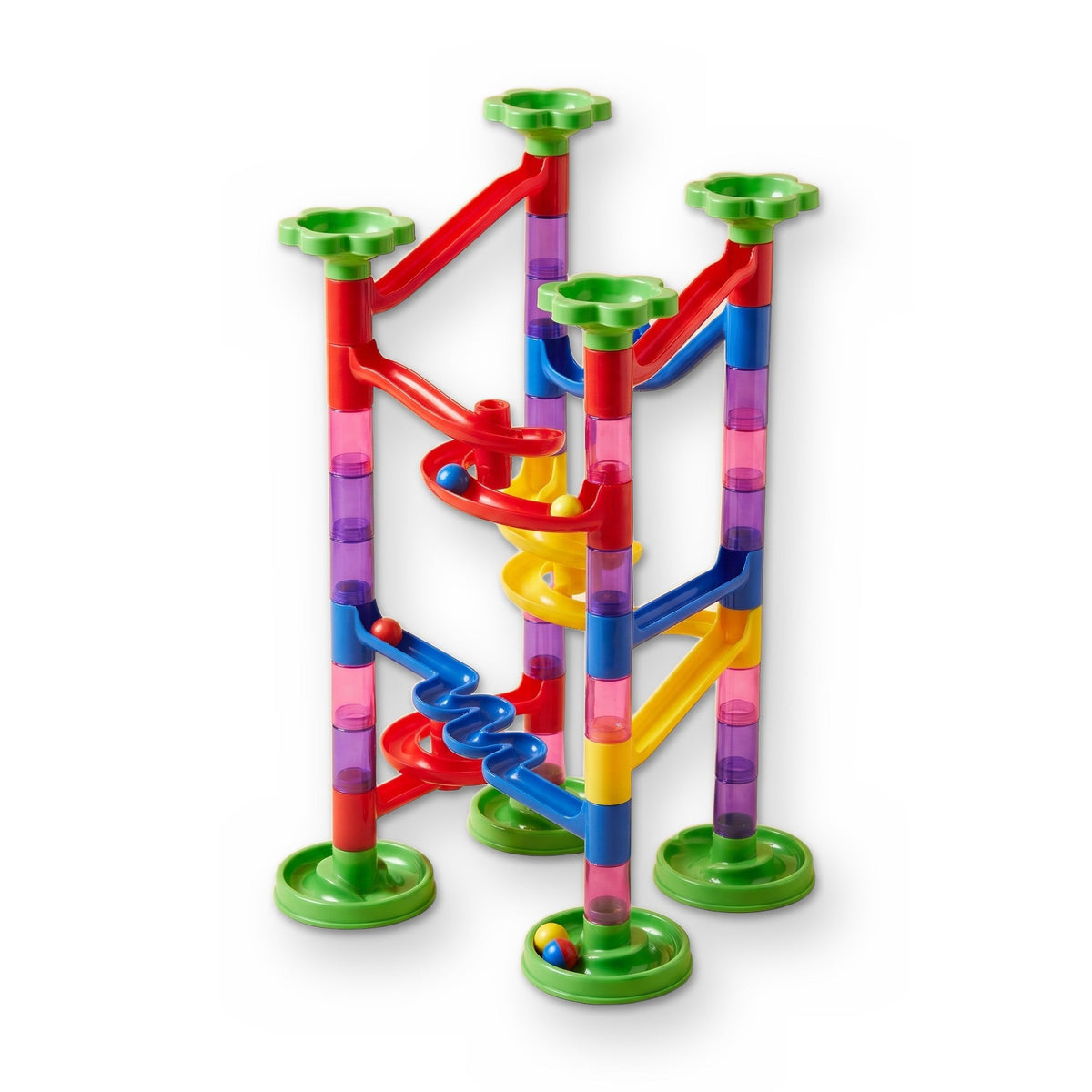 MarbleQuest Studio Junior: a built marble run of clear colored tubes, red, blue and yellow tracks and spirals, on green bases