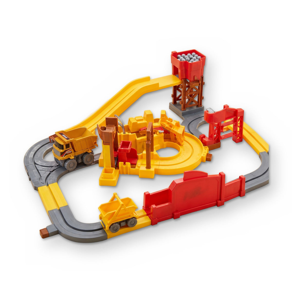 Quarry Construction Site: a track set with a dump truck, a red loading station full of grey balls, a ramp and a yellow quarry