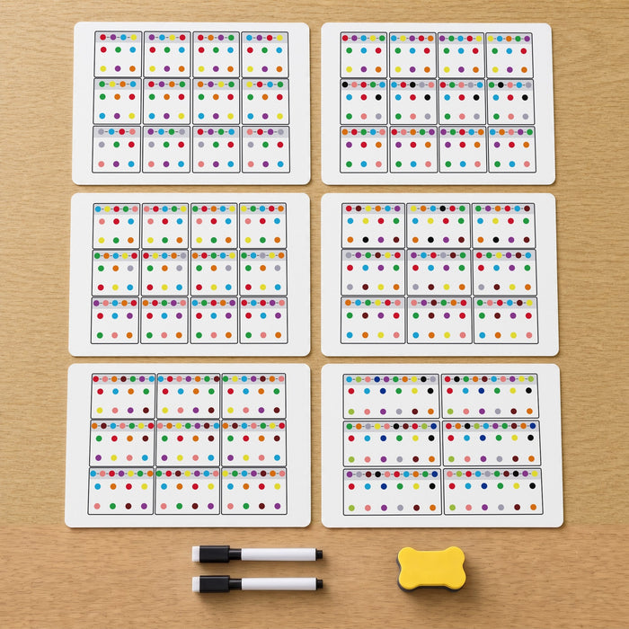 The set laid out: six dot puzzle cards, two black markers and a yellow eraser.
